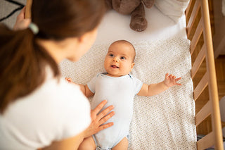 How Long Can A Baby Sleep In A Bassinet — And When Should They Stop?
