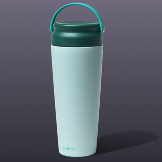 Teal breast milk cooler with handle on a white background