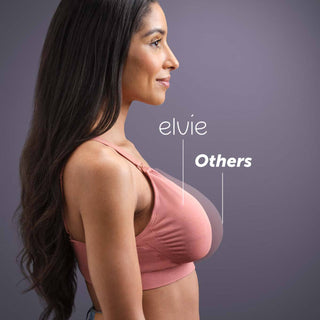 Woman wearing a pink bra with 'elvie' and 'Others' labels highlighting slimline Elvie Pump design on a purple background