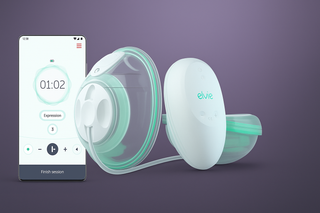 Elvie Stride breast pump on dark purple background with smartphone showing app integration