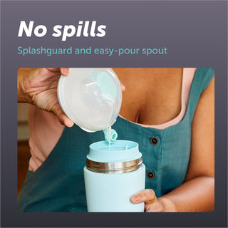 A woman pours breast milk from Elvie Wave manual breast pump in to Elvie Breast Milk Cooler