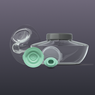 Replacement parts for Elvie Pump on a dark background